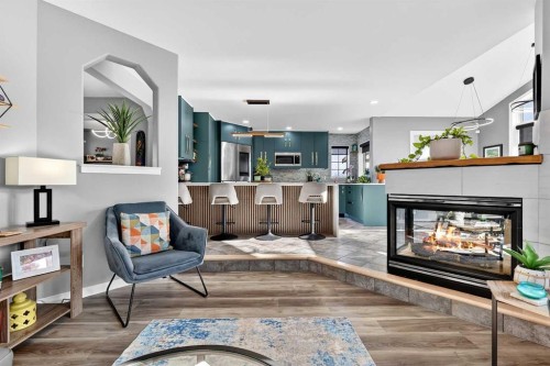 61 Somerset Crescent Sw, Calgary, AB - Indoor Photo Showing Living Room With Fireplace