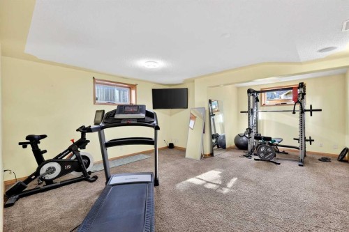 61 Somerset Crescent Sw, Calgary, AB - Indoor Photo Showing Gym Room