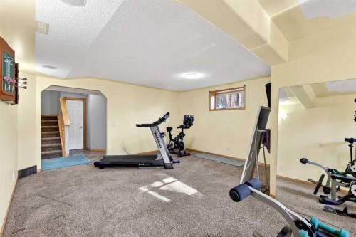 61 Somerset Crescent Sw, Calgary, AB - Indoor Photo Showing Gym Room