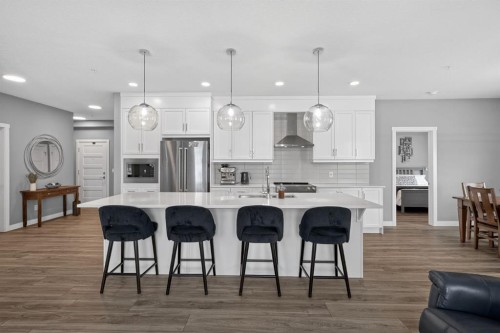 105-55 Wolf Hollow Crescent Se, Calgary, AB - Indoor Photo Showing Kitchen With Upgraded Kitchen