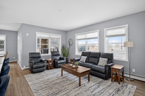 105-55 Wolf Hollow Crescent Se, Calgary, AB - Indoor Photo Showing Living Room
