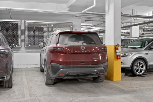 105-55 Wolf Hollow Crescent Se, Calgary, AB - Indoor Photo Showing Garage