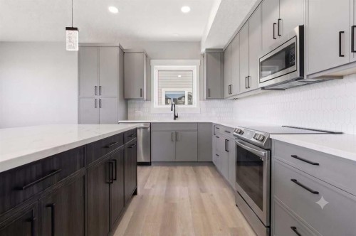 124 Coote Street, Cayley, AB - Indoor Photo Showing Kitchen With Upgraded Kitchen