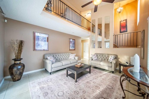 959 Ranchview Crescent Nw, Calgary, AB - Indoor Photo Showing Living Room