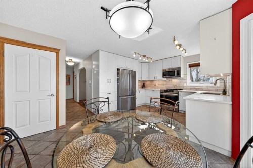 228 Riverside Close Se, Calgary, AB - Indoor Photo Showing Kitchen