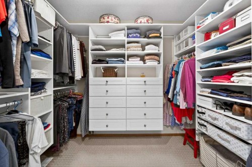 228 Riverside Close Se, Calgary, AB - Indoor With Storage