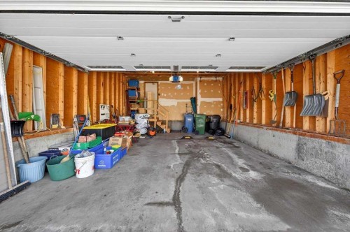 228 Riverside Close Se, Calgary, AB - Indoor Photo Showing Garage