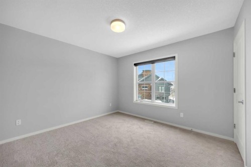 455 Ascot Circle Sw, Calgary, AB - Indoor Photo Showing Other Room