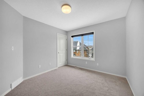 455 Ascot Circle Sw, Calgary, AB - Indoor Photo Showing Other Room