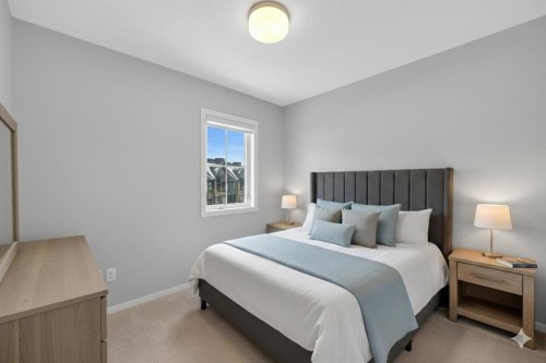 455 Ascot Circle Sw, Calgary, AB - Indoor Photo Showing Bedroom