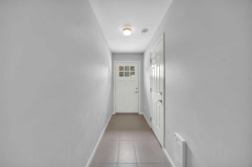 455 Ascot Circle Sw, Calgary, AB - Indoor Photo Showing Other Room