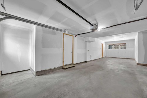 455 Ascot Circle Sw, Calgary, AB - Indoor Photo Showing Garage