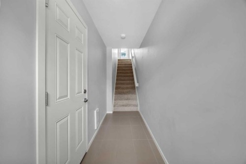 455 Ascot Circle Sw, Calgary, AB - Indoor Photo Showing Other Room