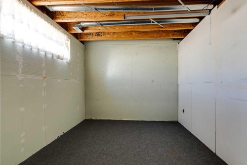 36 Del Monica Villas Ne, Calgary, AB - Indoor Photo Showing Basement