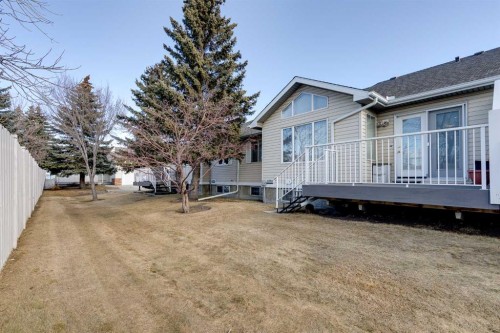 36 Del Monica Villas Ne, Calgary, AB - Outdoor With Deck Patio Veranda