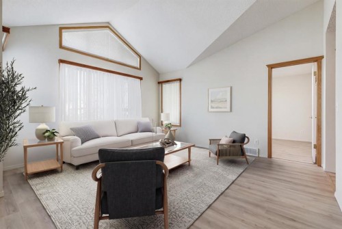 36 Del Monica Villas Ne, Calgary, AB - Indoor Photo Showing Living Room