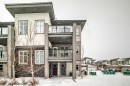 44 Spring Creek Common Sw, Calgary, AB  - Outdoor With Balcony With Facade 