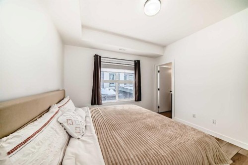 44 Spring Creek Common Sw, Calgary, AB - Indoor Photo Showing Bedroom