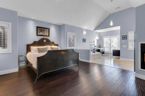 448 13 Street Nw, Calgary, AB - Indoor Photo Showing Living Room With Fireplace