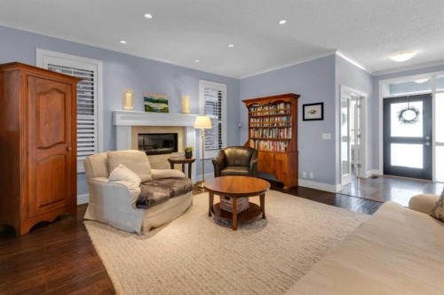 448 13 Street Nw, Calgary, AB - Indoor Photo Showing Living Room With Fireplace