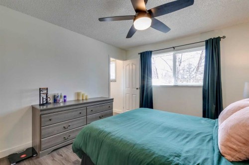 14692 Deer Ridge Drive Se, Calgary, AB - Indoor Photo Showing Bedroom
