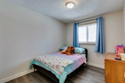 14692 Deer Ridge Drive Se, Calgary, AB - Indoor Photo Showing Bedroom