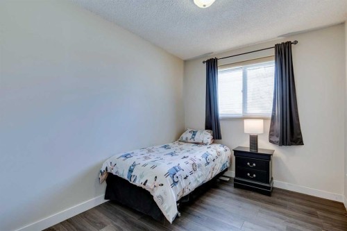 14692 Deer Ridge Drive Se, Calgary, AB - Indoor Photo Showing Bedroom