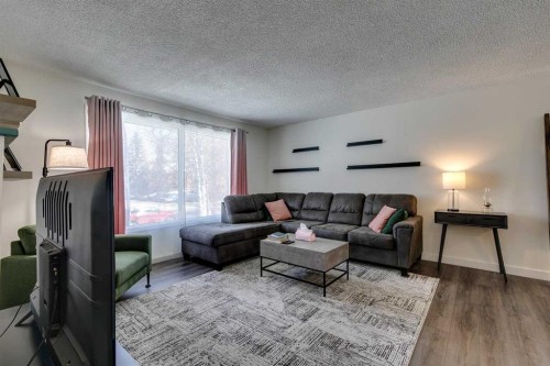 14692 Deer Ridge Drive Se, Calgary, AB - Indoor Photo Showing Living Room