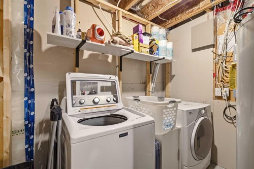 35 Sage Hill Way Nw, Calgary, AB - Indoor Photo Showing Laundry Room