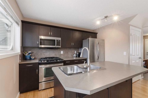 35 Sage Hill Way Nw, Calgary, AB - Indoor Photo Showing Kitchen With Stainless Steel Kitchen With Double Sink With Upgraded Kitchen