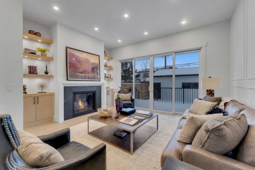 1727 19 Avenue Nw, Calgary, AB - Indoor Photo Showing Living Room With Fireplace