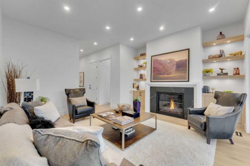 1727 19 Avenue Nw, Calgary, AB - Indoor Photo Showing Living Room With Fireplace