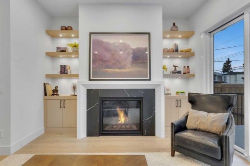 1727 19 Avenue Nw, Calgary, AB - Indoor Photo Showing Living Room With Fireplace