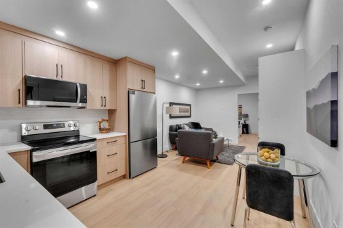 1727 19 Avenue Nw, Calgary, AB - Indoor Photo Showing Kitchen With Upgraded Kitchen