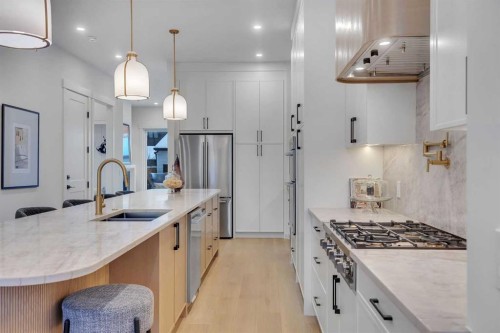 1727 19 Avenue Nw, Calgary, AB - Indoor Photo Showing Kitchen With Double Sink With Upgraded Kitchen