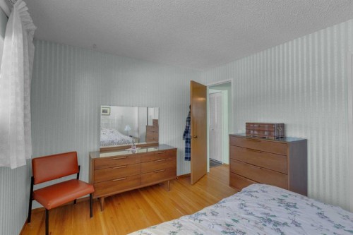 9628 Palisan Place Sw, Calgary, AB - Indoor Photo Showing Bedroom