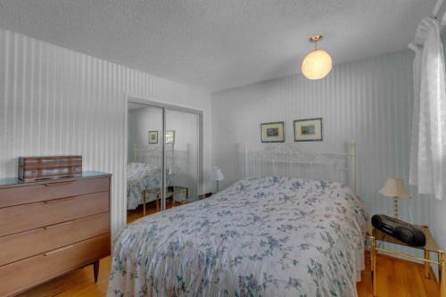 9628 Palisan Place Sw, Calgary, AB - Indoor Photo Showing Bedroom