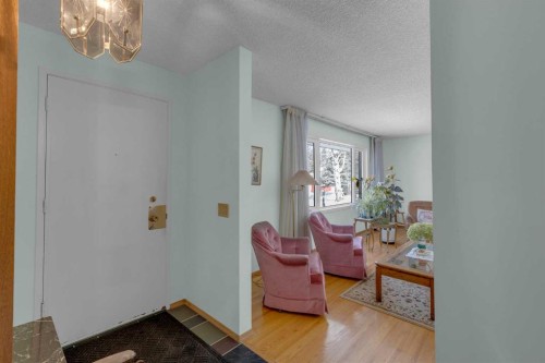 9628 Palisan Place Sw, Calgary, AB - Indoor Photo Showing Other Room