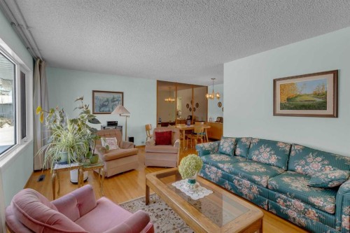 9628 Palisan Place Sw, Calgary, AB - Indoor Photo Showing Living Room