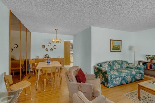 9628 Palisan Place Sw, Calgary, AB - Indoor Photo Showing Living Room