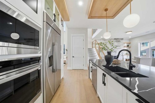 425 Watercrest Place, Chestermere, AB - Indoor Photo Showing Kitchen With Double Sink With Upgraded Kitchen