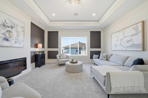 425 Watercrest Place, Chestermere, AB - Indoor Photo Showing Living Room With Fireplace