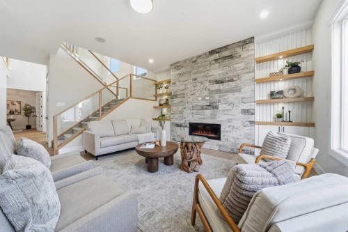 425 Watercrest Place, Chestermere, AB - Indoor Photo Showing Living Room With Fireplace