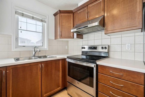 268 Cityscape Gardens Ne, Calgary, AB - Indoor Photo Showing Kitchen With Double Sink