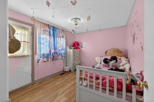 6003 Pinepoint Drive Ne, Calgary, AB - Indoor Photo Showing Bedroom