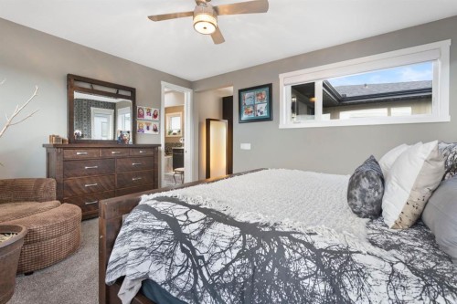 13 Arrowleaf Landing, Rural Rocky View County, AB - Indoor Photo Showing Bedroom