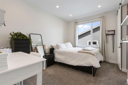 13 Arrowleaf Landing, Rural Rocky View County, AB - Indoor Photo Showing Bedroom