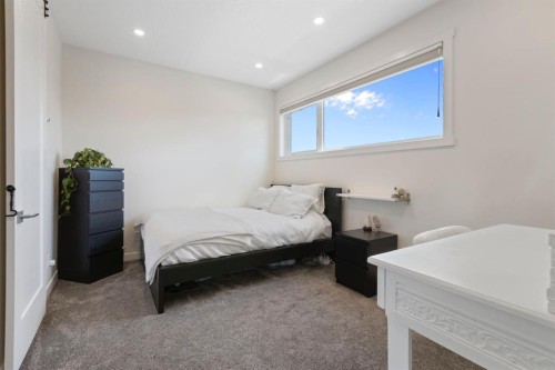 13 Arrowleaf Landing, Rural Rocky View County, AB - Indoor Photo Showing Bedroom