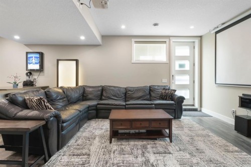 13 Arrowleaf Landing, Rural Rocky View County, AB - Indoor Photo Showing Living Room