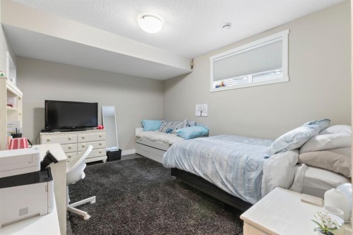 13 Arrowleaf Landing, Rural Rocky View County, AB - Indoor Photo Showing Bedroom